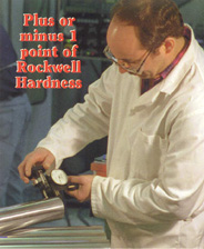 On the plant floor: hardened machine crossarms are checked before assembly
